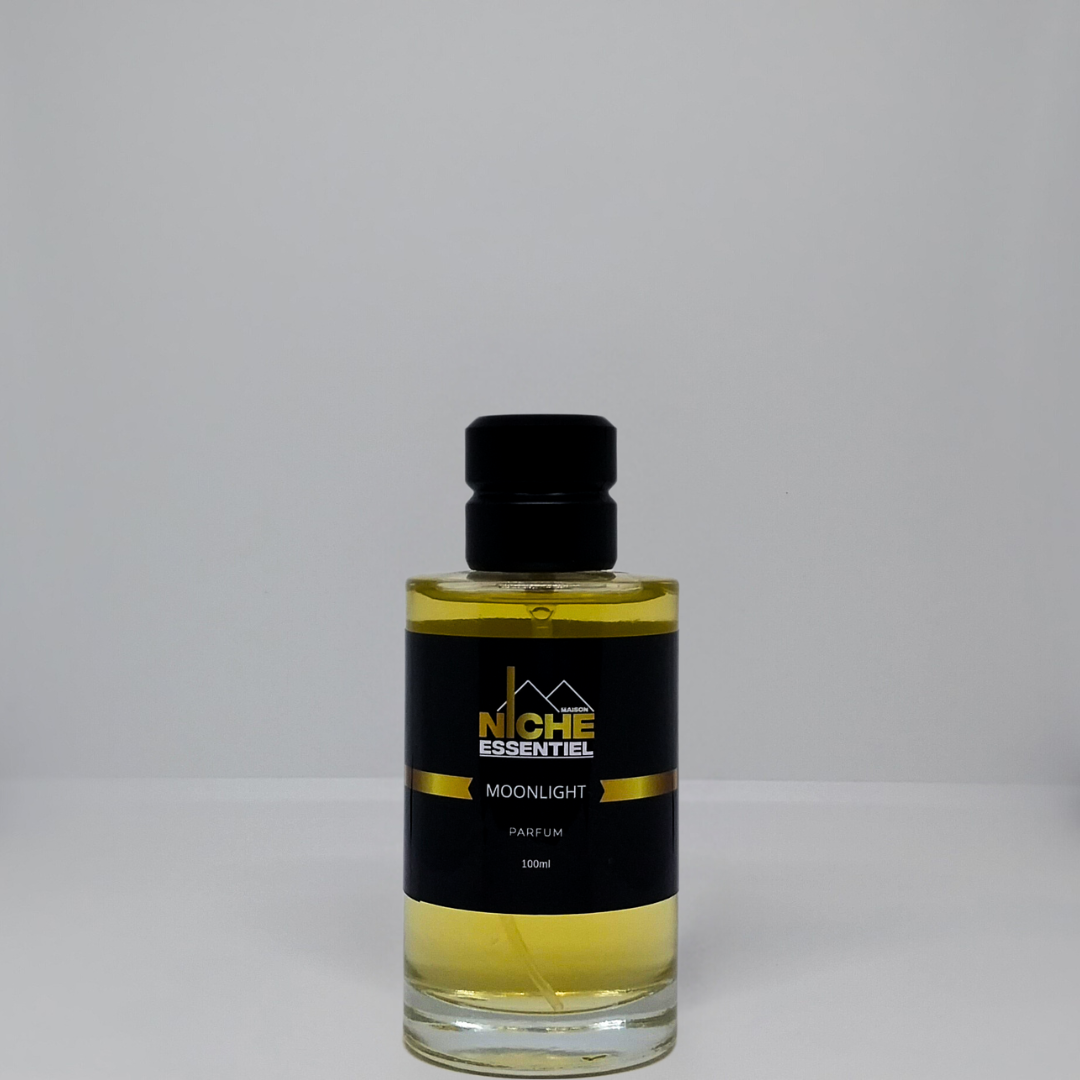 Glass bottle of Moonlight perfume with a black label and gold accents, containing 100ml of fragrance.